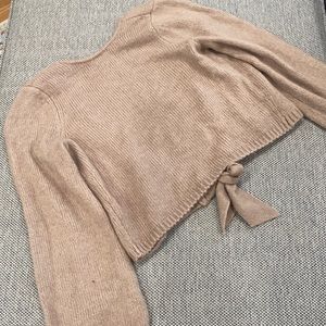 Open tie back sweater